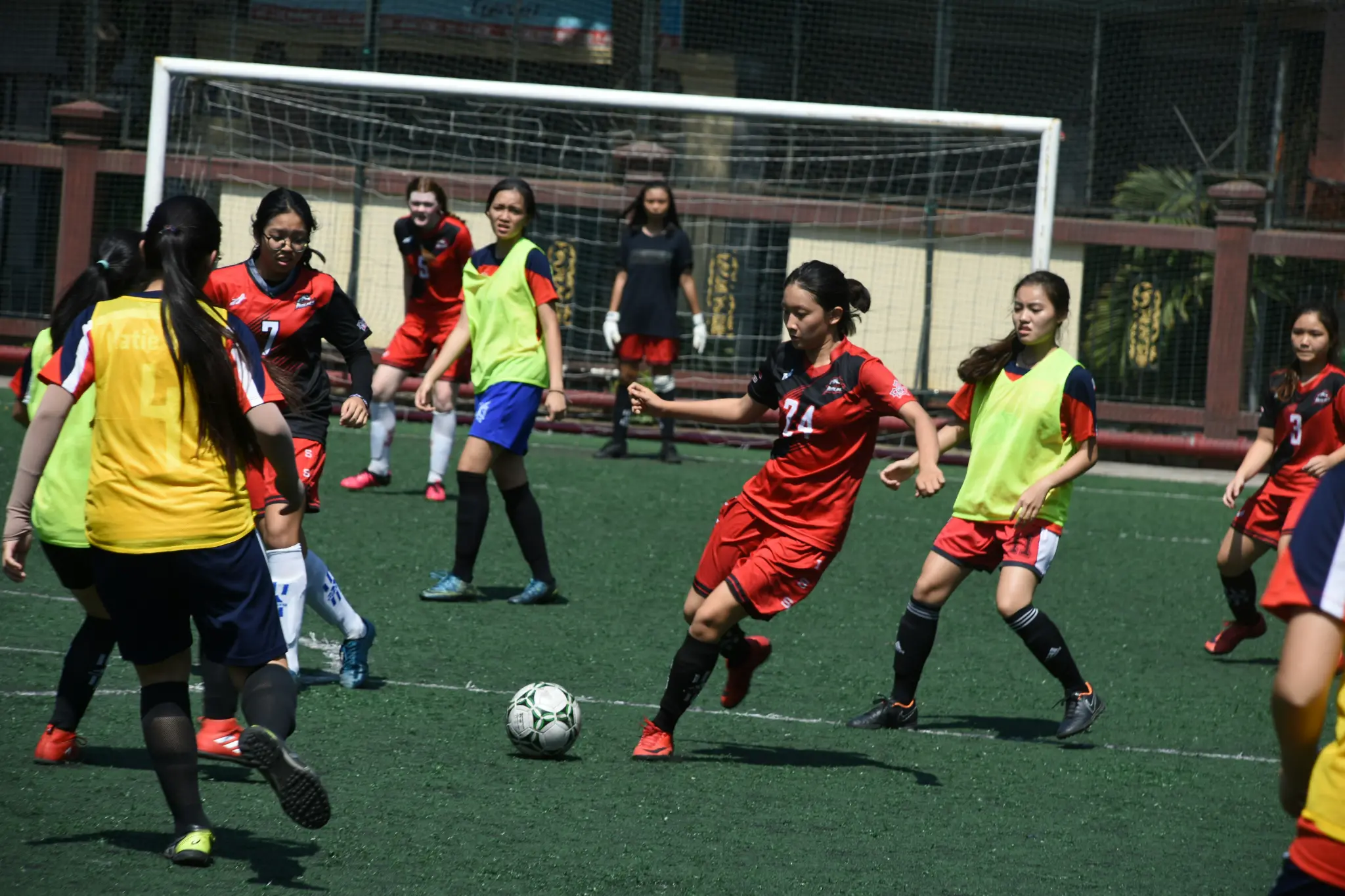 Youth soccer players competing during an active sports event.